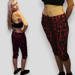 Super Cute Vintage y2k Pink and Black Live Love Life Bebe Sport Capri Pants Capris