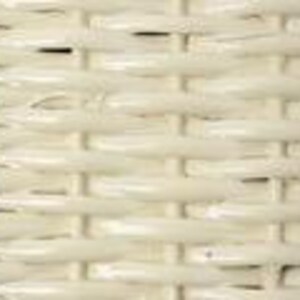 May include: Close-up of a section of woven wicker. The wicker is a light cream color, with a repeating pattern of horizontal and vertical lines. The weave is tight and even, creating a textured surface.