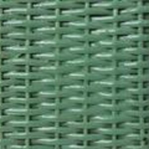 May include: Close-up of a rectangular, woven basket in a muted green color. The basket's texture is created by the interwoven pattern of the material. The basket is likely made of wicker or a similar material. The basket is empty.