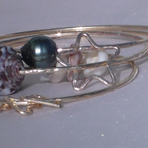 Floating star bangle.