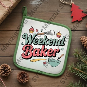 May include: A white and green pot holder with the text "Weekend Baker" in a retro font. The design includes illustrations of cupcakes, a whisk, and a mixing bowl. The pot holder has a green loop for hanging.