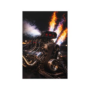 May include: A close-up image of a powerful, chrome-plated engine, with visible belts, tubes, and a large air intake. Flames and smoke emanate from the engine, creating a dramatic effect. The background is dark, highlighting the engine's intricate details.