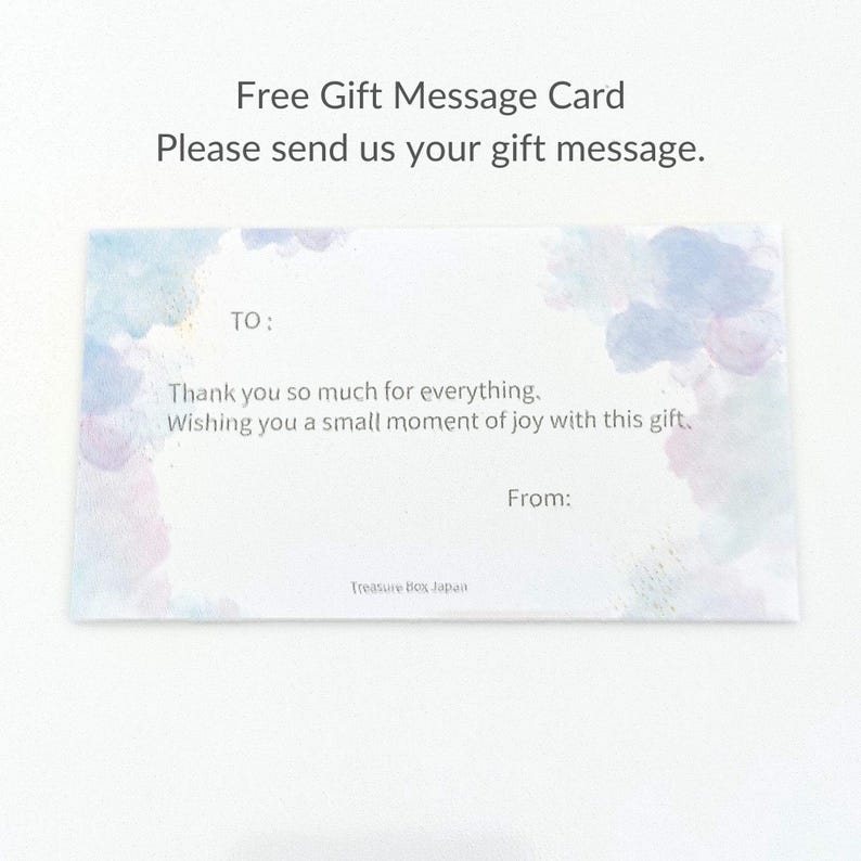 May include: A rectangular gift message card featuring soft watercolor accents in blue and purple at the corners. The card includes the text TO:, FROM:, and the message: Thank you so much for everything, Wishing you a small moment of joy with this gift.