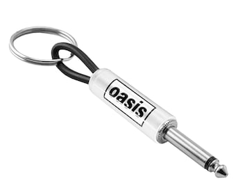 Llavero con el logotipo de Oasis para guitarra