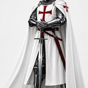 May include: A knight in full armor, holding a long sword. The knight wears a white tunic with a red cross, a silver helmet, and chainmail. The image includes the text "MEDIEVAL STORE".