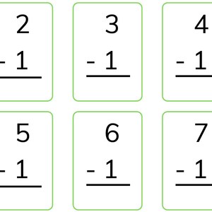 May include: Six flashcards with subtraction problems. Each card has a green border and displays a subtraction problem: 2-1, 3-1, 4-1, 5-1, 6-1, and 7-1. The numbers and symbols are in black on a white background.