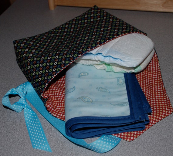 Items similar to Grab and Go Diaper Clutch with Changing Pad, Handmade
