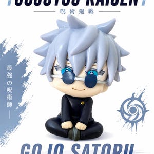 May include: A figurine of Gojo Satoru from Jujutsu Kaisen, with light blue hair and glasses. The figure is seated with hands on knees, wearing a black uniform. The text "JUJUTSU KAISEN" and "GOJO SATORU" are displayed.