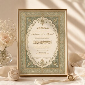 May include: A vertical rectangular framed Islamic marriage certificate with a sage green and gold floral border. The document features Arabic calligraphy and English text stating the agreement between Amna and Murad, dated September 29, 2030.