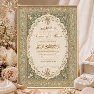 May include: A rectangular marriage certificate framed in gold, featuring a sage green and cream floral border. The document includes Arabic calligraphy and English text stating the marriage of Amna and Murad on Thursday, September 29, 2030.