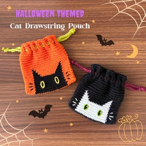 May include: Two crochet drawstring pouches featuring cat faces. One pouch is orange with a black cat face and lime green drawstring. The other is black with a white cat face and purple drawstring. Both have embroidered eyes and whiskers.