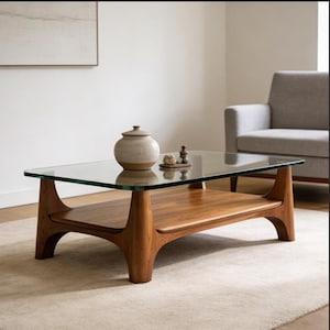 May include: A set of three ceramic mugs with a speckled, matte finish. The mugs are in shades of cream, light gray, and dark gray. Each mug has a simple, minimalist design and a rounded handle.