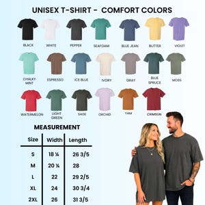 May include: A collection of twenty Comfort Colors unisex t-shirts in various solid colors including black, white, pepper, seafoam, blue jean, butter, violet, chalky mint, espresso, ice blue, ivory, gray, blue spruce, moss, watermelon, light green, sage, orchid, yam, and crimson. A size chart displays width and length measurements in inches for sizes S through 2XL. Two individuals are shown wearing dark gray t-shirts.