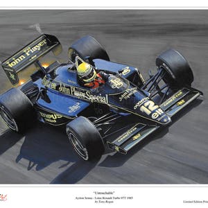 May include: A black and gold Formula One racing car with the words "John Player Special" on the side. The car is on a black tarmac track and has the number "12" on the side.