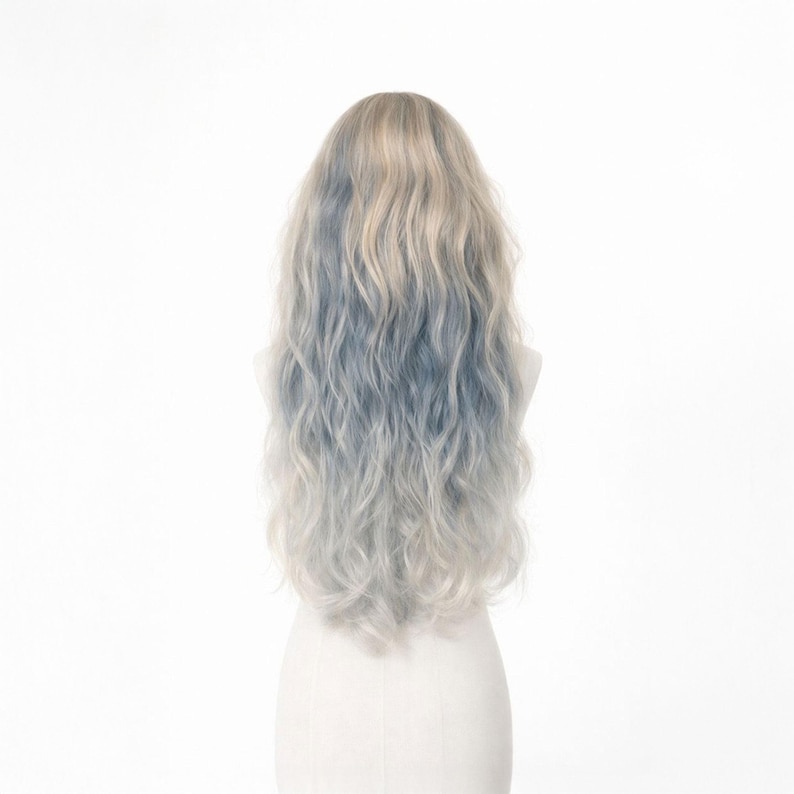May include: A long, wavy wig with a blend of light blonde, blue, and silver tones. The wig is styled with loose, flowing waves and is displayed on a white mannequin head against a white background. The hair has a natural-looking texture.