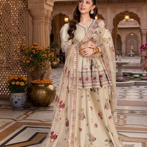peplum dress pakistani Peach Wedding Dress: Embroidered Peplum Top & Sharara Pant