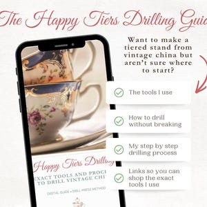 May include: A smartphone displaying The Happy Tiers Drilling Guide, a digital resource for drilling vintage china. The screen shows text about tools, drilling processes, and shopping links, alongside an image of stacked floral teacups.