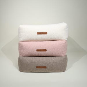 May include: A weathered wooden sign, inscribed with 'Welcome to our home' in white. The sign has a distressed appearance, ideal for a porch or hallway, and is designed to create a welcoming atmosphere.