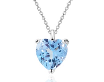 Natural Sky Blue Topaz Gemstone Heart Pendant On a 925 Sterling Silver Stamped Chain.