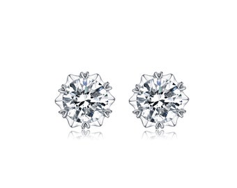 Sterling Silver Earrings with a Snowflake of a Moissanite Diamond.