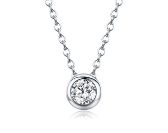 Solitaire Pendant Necklace with a Round Brilliant Moissanite Diamond in a bezel setting.