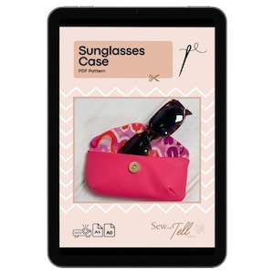 May include: A digital tablet displays a pink sunglasses case with a pair of sunglasses inside. The case is open, revealing a patterned interior. The text "Sunglasses Case PDF Pattern" is at the top of the image.