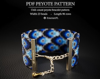May include: A PDF peyote pattern for an odd-count peyote bracelet with a width of 23 beads and a length of 96 rows by EmerantPL. The image displays a beaded bracelet featuring a blue and black eye motif with gold-toned metal end bars and a chain.