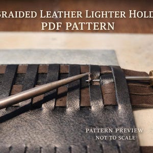 May include: A close-up of a leather lighter holder in progress. The holder is made of braided black and brown leather strips. A metal tool with a wooden handle is used to stitch the leather. The text "BRAIDED LEATHER LIGHTER HOLDER PDF PATTERN" is at the top.