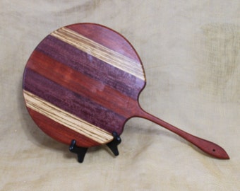 Round Cutting Board with Handle Striped with Paduak, Zebra Wood and Purple Heart - Pizza Serving Board