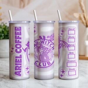 May include: A set of three stainless steel tumblers with white straws. The tumblers feature a purple and white marble design. One tumbler reads "ARIEL COFFEE" in purple text. Another has a "BAD WITCH CLUB" design. The third has a coffee order form.