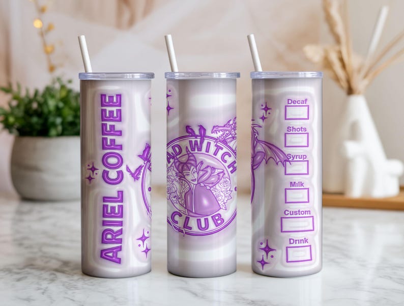 May include: A set of three stainless steel tumblers with white straws. The tumblers feature a purple and white marble design. One tumbler reads "ARIEL COFFEE" in purple text. Another has a "BAD WITCH CLUB" design. The third has a coffee order form.