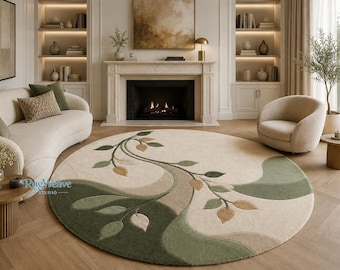 Tappeto rotondo in lana con motivo botanico, tappeto trapuntato floreale color verde salvia e crema