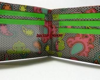 hand made duct tape wallet with colored lace deisgn on it