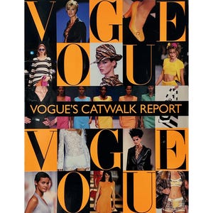 May include: A vintage Vogue magazine cover with the word "Vogue" in large orange letters. The cover features images of models and the text "Vogue's Catwalk Report". The background is black.