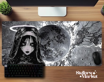 May include: A black and white mousepad featuring a gothic nun illustration with a halo, a large planet, and abstract ink splatters. A black keyboard and mouse are also visible. The mousepad has the text "Stellars Market".