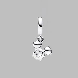 May include: A silver charm pendant in the shape of Mickey Mouse. The charm has a loop at the top for hanging and features Mickey's iconic silhouette with a cut-out design. The charm is made of shiny, polished metal.