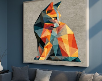 May include: Geometric cat art print. The artwork features a stylized cat in a sitting position, composed of colourful triangular shapes. The colour palette includes shades of orange, yellow, teal, and black against a grey background, framed in a white border.