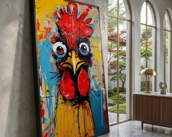 May include: A large framed abstract painting of a rooster. The artwork features a vibrant color palette of red, yellow, blue, and black. The rooster's face is the focal point, with large, expressive eyes and a prominent comb. The painting is displayed in a modern interior.