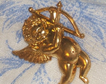 VIntage brass stamping. CUPID cherub antique brass charms cabochon stamping 45mm (1)