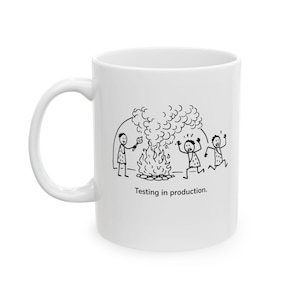 Testing in Production Mug - Funny Programmer Caveman Cartoon | Developer & IT Humor Coffee Mug
