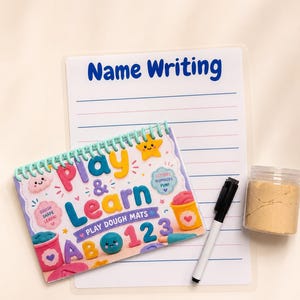 May include: A white Name Writing practice mat with blue lines, a spiral-bound Play & Learn play dough mat book with colorful illustrations of letters and numbers, a black dry-erase marker, and a small clear jar filled with tan-colored play dough.