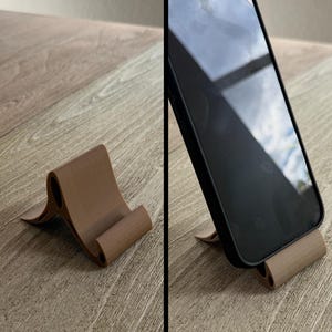 May include: A rustic wooden sign with the text "Welcome to our home" in white lettering. The sign has a distressed finish and a simple, inviting design, ideal for entryway decor.