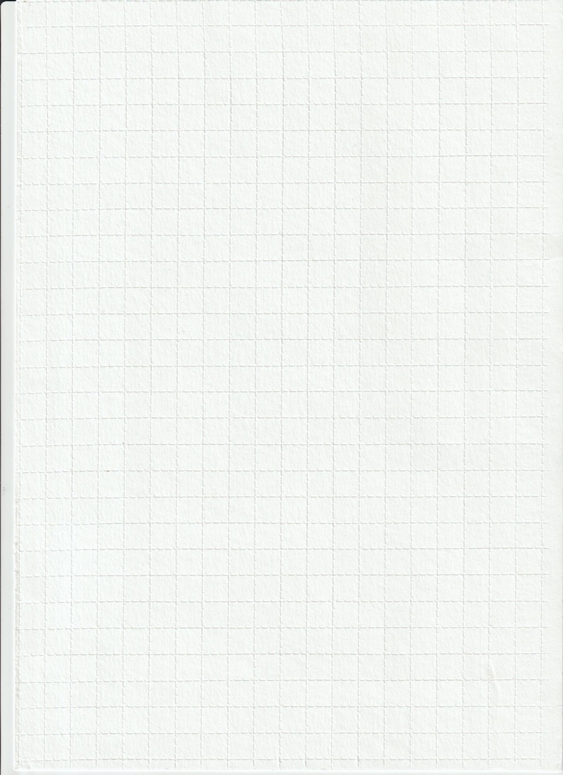 May include: A white, textured paper with a grid pattern. The grid is composed of small squares, each outlined with a subtle, dotted line. The paper has a slightly raised texture, giving it a tactile quality.