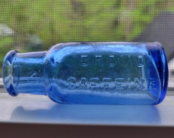 Small Medium Cobalt Blue Medicine Bottle Embossed Bromo Caffeine