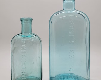 Lot of Two Different Sizes Antique Aqua Embossed Pond's Extract Bottles