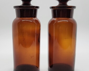 Lot of Two Small Amber Apothecary Jars with Ground Glass Stoppers