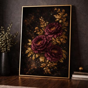 May include: A framed art print featuring three large, deep burgundy peonies with golden leaves against a dark, starry background. The artwork is in a gold frame, creating a luxurious aesthetic.