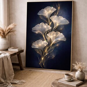 May include: A framed art print with a floral design. The artwork depicts luminous, white, fan-shaped petals with golden accents against a deep navy blue background. The gold frame complements the artwork's elegant aesthetic.