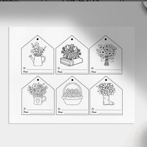 May include: Six black and white printable gift tags featuring different floral designs. Each tag has a space for "To:" and "From:" at the bottom.