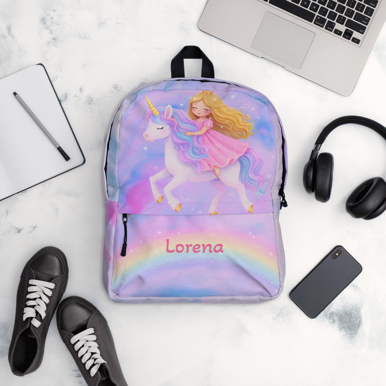 The unicorn backpack on a plain background, showing its overall size and shape